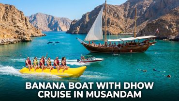 Banana boat with dhow cruise on clear blue waters during a marine adventure